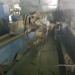 UM TORNO COPIADOR COM EQUIPAMENTOS MARCA ROMI, N° 0083X.