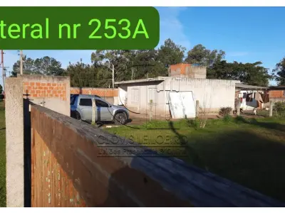 LOTE 001 - UM TERRENO LOCALIZADO NO SITIO SANTA CRUZ, MATR 76.086